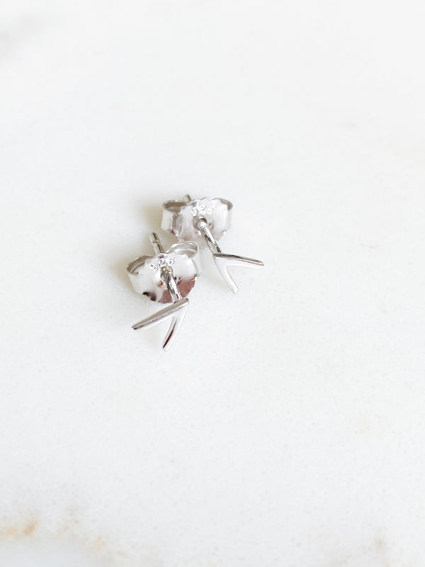 Isaiah Collection White Rhodium Plate Brightly Polished Arrow Studs