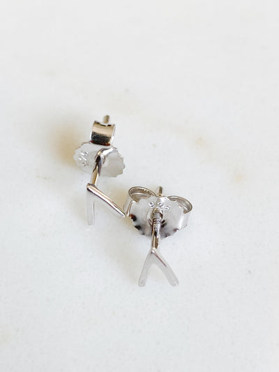 Isaiah Collection White Rhodium Plate Brightly Polished Arrow Studs