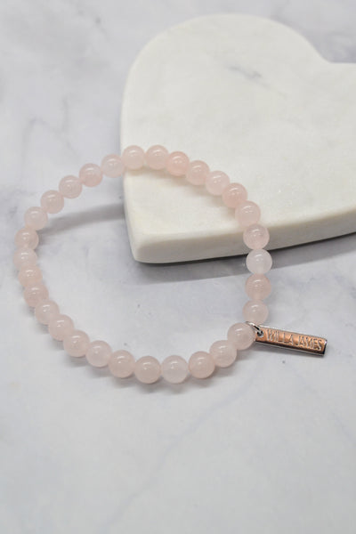 Love and Devotion White Rhodium Plate Polished Rose Quartz Stretch Bracelet